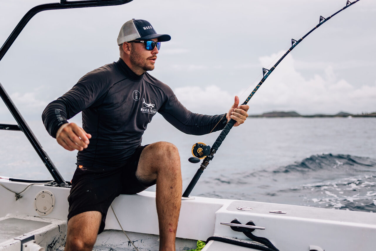 Angler posing with a fishing rod