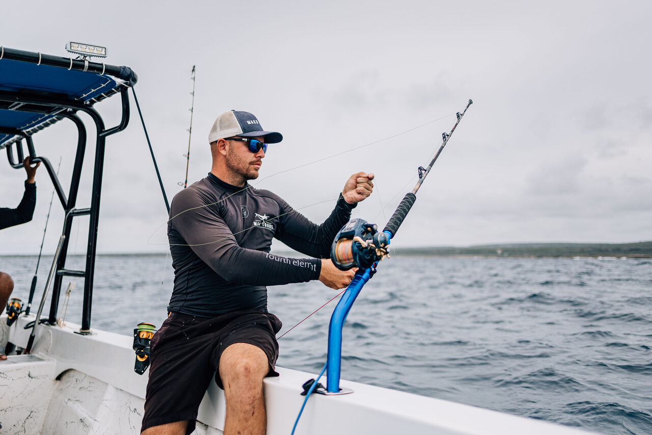 Fishing rod bent into a fish
